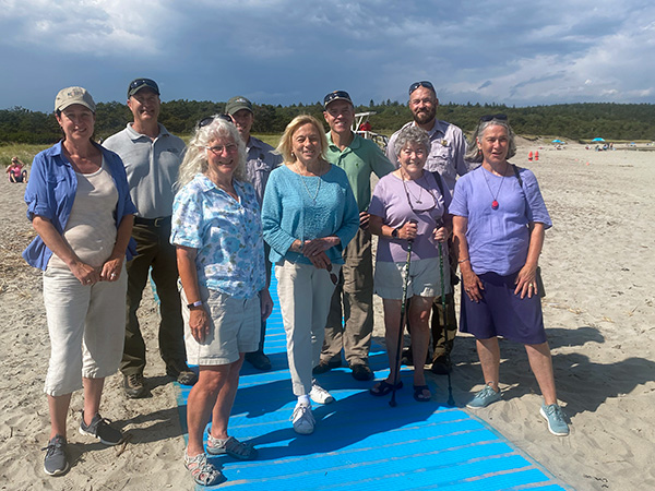 Gov. Mills at Popham Beach State Park to see the new accessibility upgrade, a mobility pathway.