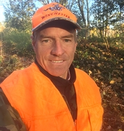 Andy Cutko, Director of the Maine Bureau of Parks and Lands, in blaze orange while hunting.