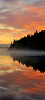 Sunrise on Umsaskis Lake on the Allagash Wilderness Waterway. Photo by Steve Day.