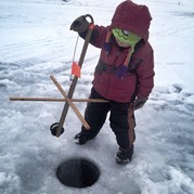 Child ice fishing.