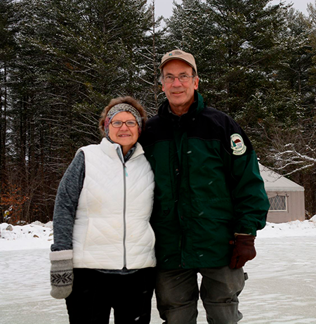 Dianna and Bruce Farnham at the outdoor ice skating rink at Mount Blue State Park.