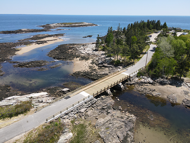 Drone shot of the repaired bridge at Reid State Park.