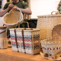 A variety of hand-woven baskets. Photo courtesy of the Hudson Museum and the Maine Indian Basketmakers Alliance.