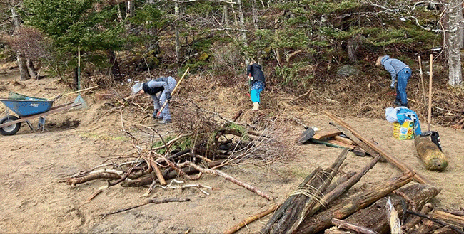 Volunteers at Reid State Park cleaning up storm damage.