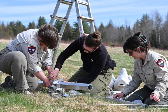 Building the Purple Martin Nest structure. MDIFW photo.