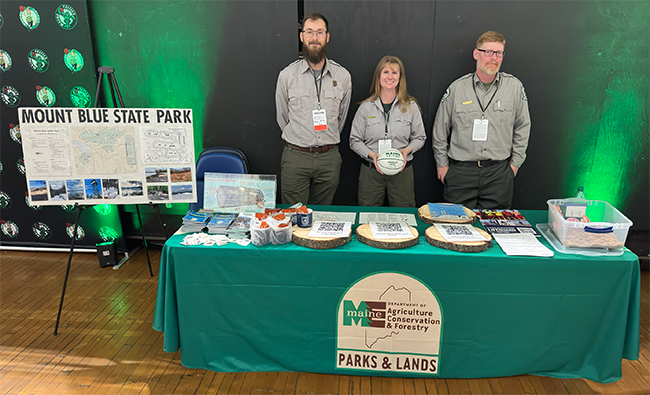 Mount Blue State Park staff and table as the Maine Celtics home game on Nov. 22, 2024.