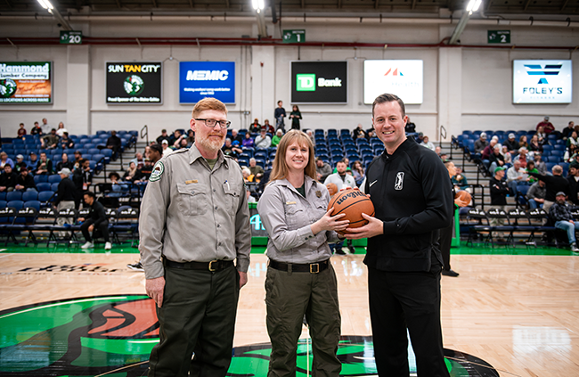 Mt. Blue State Park staff with Maine Celtics game ball and referee.