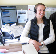 Abby Andreasen working in the Camping Reservations office.