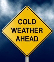 Road sign with message "Cold Weather Ahead"