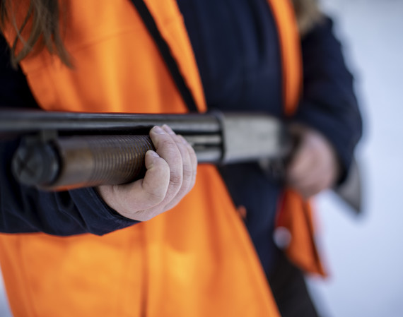 woman holding a shot gun