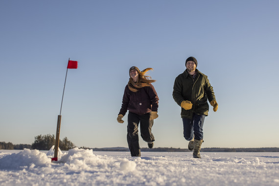 two people running to flag