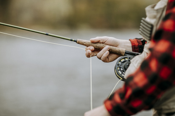 fly angler dressed warm