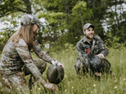 Setting turkey decoys in a field