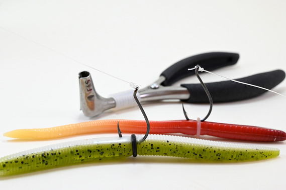 soft plastic fishing lures secured on the hook with an o-ring