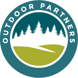 Outdoor Partners logo a circular logo with green and blue land symbol