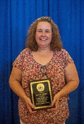 Gina M. Pitcher.