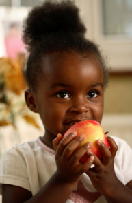 Girl holding an apple