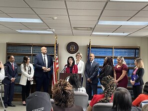 AG Dana Nessel and the eight staff who comprise the Wayne County Job Court team