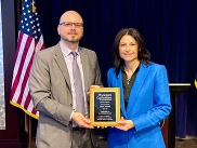 AG accepting Physicians Committee for Responsible Medicine (PCRM) award with Ryan Merkley