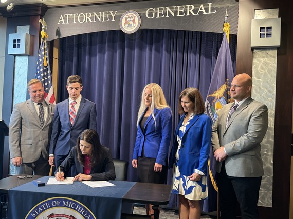 Michigan Attorney General Dana Nessel signs bill as acting governor