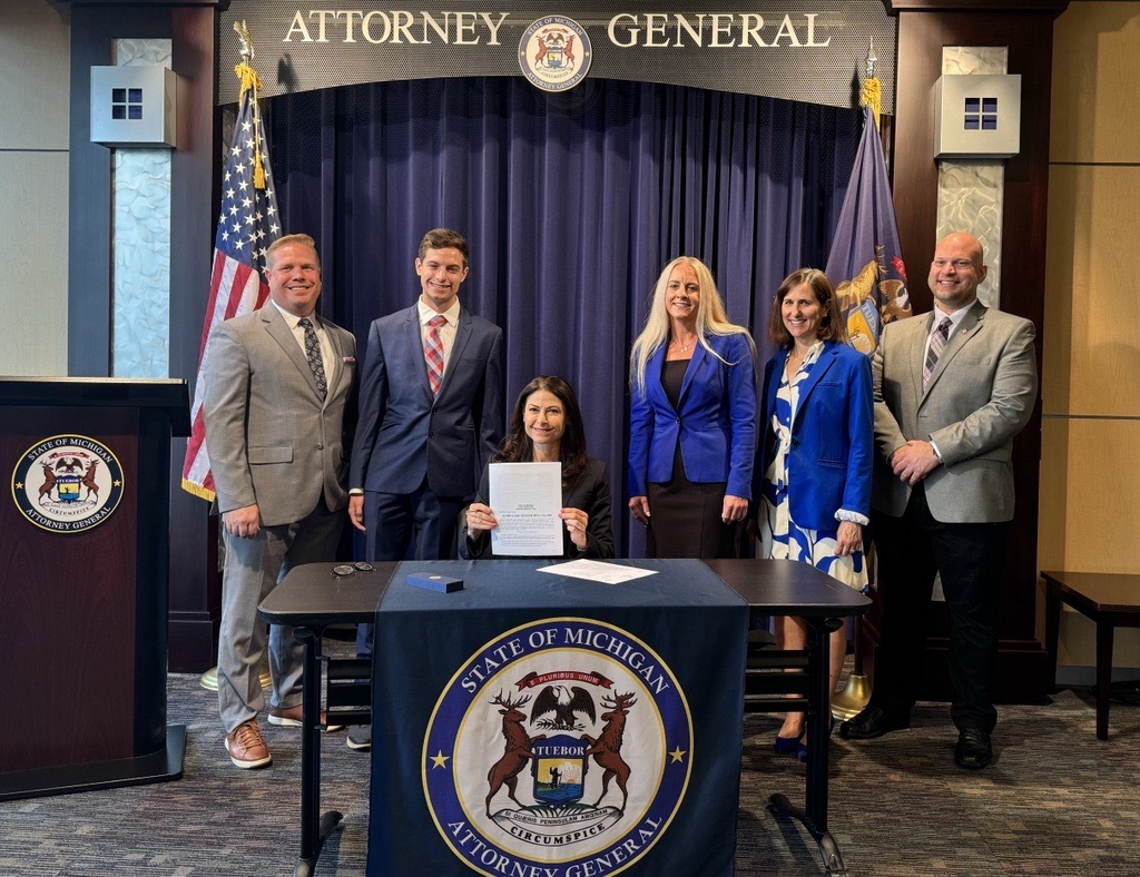 Michigan Attorney General Dana Nessel signs bill as acting governor