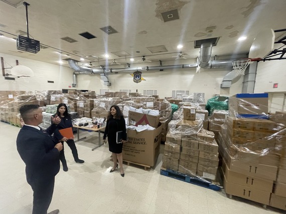 Michigan Attorney General Dana Nessel and White House Domestic Policy Advisor Neera Tanden tour evidence warehouse at FORCE Team headquarters.