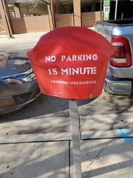 Red meter bags downtown Ann Arbor