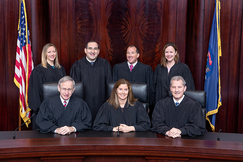 Justitia - Why do courts take group photos?