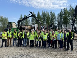 Finland Trade and Study Mission forestry tour group at Riveria Forest Machine Skilled Trade and Training Center in Valtimo, Finland.