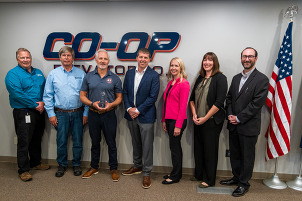 Cooperative Elevator Co. and MDARD staff pose at the Ag Exporter of the Year Award ceremony
