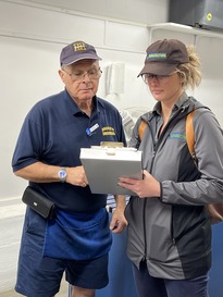 Photograph of an MDARD inspector meeting with a business owner during a food safety inspection