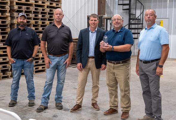 Photograph of MDARD Director Tim Boring presenting the 2026 Michigan Ag Exporter of the Year award to Roger Hupfer of Freeland Bean and Grain