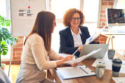 Women working together in an office