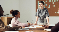 teacher standing in front of a classroom of students