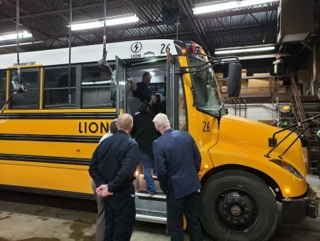 Electric school bus in Michigan undergoing inspection 