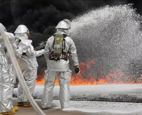 Picture of Fire Fighters Spraying Foam to Suppress a Fire