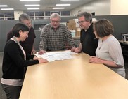 Air Quality Division permit section staff reviewing documents.