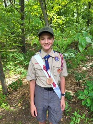 Cole Sherman, Eagle Scout, worked on a scrap tire project in Osceola County. Courtesy of DNR.