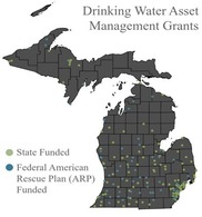 Map of the state of Michigan showing locations of EGLE's Drinking Water Asset Management grants.