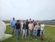 Catalyst Leadership Circle (CLC) Fellows and others visit one of TCLP?s solar power arrays. Photo by Sarah Lee.