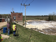 Assessing damage to the Smallwood Dam following the May 2020 flood.