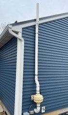 Radon Mitigation System on Homes Exterior