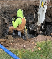 Contractor-excavating-service-line-in-Benton-Harbor