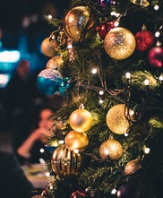 LED holiday lights adorn a Christmas tree. 