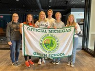 The Green Team at Pentwater Public School celebrates their certification as an Evergreen School.