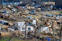 A neighborhood destroyed by a storm. 