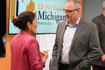 Adam Wygant, talks with Deb Haaland, Interior Dept. Secretary, in Wayne, MI. Courtesy of Laborers? International Union of North America.