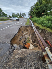 Rain washed out road in Washtenaw County in an August 2023 storm. Courtesy of Washtenaw County Road Commission.