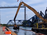 Dredging of contaminated sediment is part of remediation efforts in the Rouge River Area of Concern.