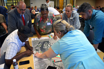 St. Joseph & Benton Harbor people study an area map. Courtesy of Michigan Sea Grant.